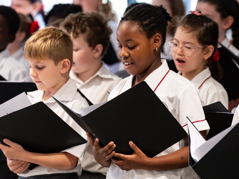 Students performing as part of the Junior School Choir.
