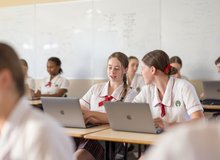Secondary students in a classroom.