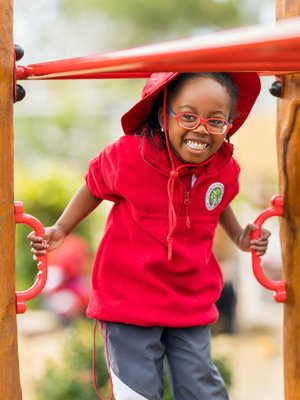 A Prep student playing on the playground.