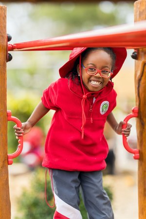 A Prep student playing on the playground.